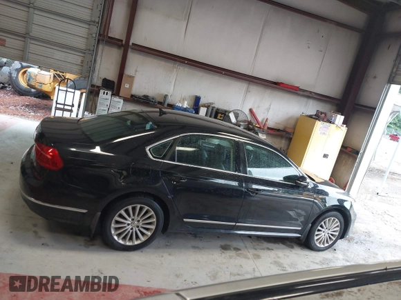 2016 Volkswagen Passat SE z VIN 1VWBT7A38GC010301, wystawiony jako IAAI lot #42316812 z przebiegiem 154 618 mil mil oraz . Historia ofert i sprzedaży dostępna na DreamBid. Obrazek 13.