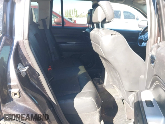2016 Jeep Compass High Altitude with VIN 1C4NJDEB1GD758355, listed as a IAAI auction lot 42785665 with 76,742 mi miles and . Bid and sale history available at DreamBid. Image 8.