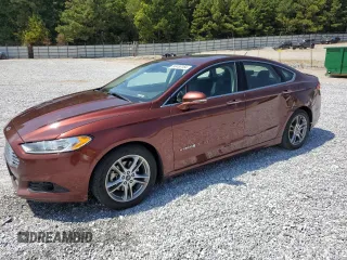 2016 Ford Fusion Titanium Hybrid with VIN 3FA6P0RU5GR282258, listed as a Copart auction lot 68453164 with 256,937 mi miles and Salvage Title. Bid and sale history available at carsss.com. Image 1.