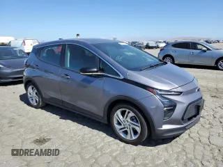 2023 Chevrolet Bolt EV 1LT with VIN 1G1FW6S05P4115360, listed as a Copart auction lot 60748555 with 69,678 mi miles and Salvage title. Bid and sale history available at DreamBid. Image 4.
