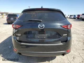 2017 Mazda CX-5 Grand Touring with VIN JM3KFBDL6H0145327, listed as a Copart auction lot 52046355 with 0 mi miles and Clean Title. Bid and sale history available at carsss.com. Image 6.