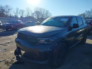 2021 Dodge Durango SXT with VIN 1C4RDHAG1MC824969, listed as a IAAI auction lot 41352831 with 91,188 mi miles and . Bid and sale history available at DreamBid. Image 2.