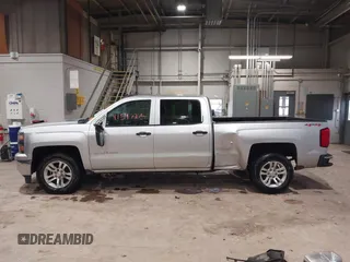 2014 Chevrolet Silverado 1500 LT with VIN 3GCUKREC7EG194659, listed as a IAAI auction lot 41547275 with 161,046 mi miles and . Bid and sale history available at DreamBid. Image 14.