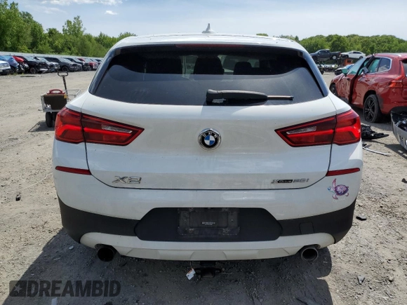 2018 BMW X2 xDrive28i z VIN WBXYJ5C35JEF80889, wystawiony jako Copart lot #57624455 z przebiegiem 80 012 mil mil oraz Szkoda całkowita • Salvage title. Historia ofert i sprzedaży dostępna na DreamBid. Obrazek 6.