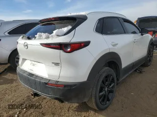 2021 Mazda CX-30 Premium with VIN 3MVDMBDY4MM308677, listed as a Copart auction lot 81869044 with 32,362 mi miles and Salvage Title. Bid and sale history available at carsss.com. Image 3.