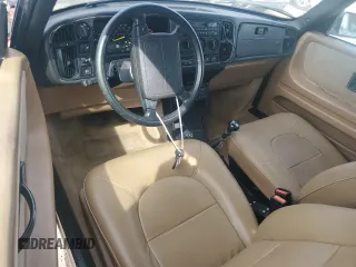 1990 Saab 900 z VIN YS3AL75LXL7013883, wystawiony jako Copart lot #75400804 z przebiegiem 165 394 mil mil oraz Szkoda całkowita • Salvage title. Historia ofert i sprzedaży dostępna na DreamBid. Obrazek 8.