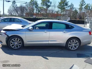2019 Chevrolet Impala Premier with VIN 1G1105S35KU143684, listed as a IAAI auction lot 41654803 with NaN miles. Bid and sale history available at carsss.com. Image 14.