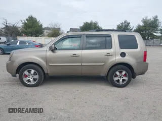 2011 Honda Pilot EX-L with VIN 5FNYF4H68BB038615, listed as a IAAI auction lot 41785830 with 164,324 mi miles and . Bid and sale history available at carsss.com. Image 13.