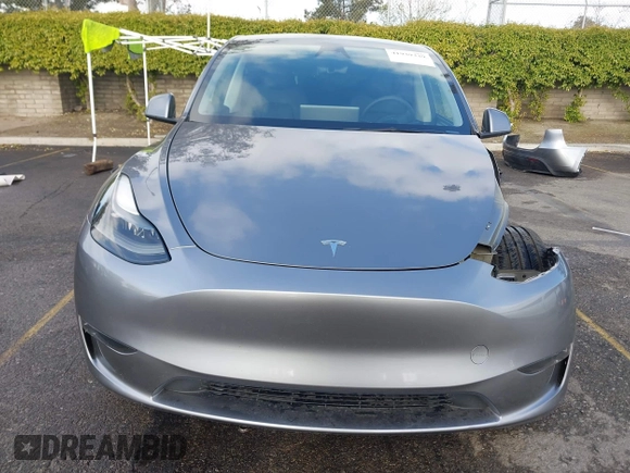 2024 Tesla Model Y Performance z VIN 7SAYGDEF5RA322392, wystawiony jako IAAI lot #41939339 z przebiegiem 20 808 mil mil oraz . Historia ofert i sprzedaży dostępna na DreamBid. Obrazek 13.