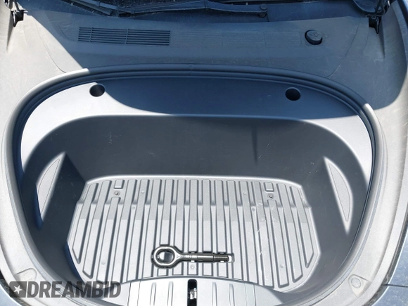 2023 Tesla Model 3 with VIN 5YJ3E1EA4PF400306, listed as a IAAI auction lot 42398603 with 18,551 mi miles and . Bid and sale history available at DreamBid. Image 10.