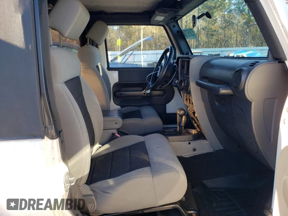2010 Jeep Wrangler Rubicon with VIN 1J4BA6D17AL132002, listed as a Copart auction lot 83869124 with 183,507 mi miles and Salvage title. Bid and sale history available at DreamBid. Image 10.