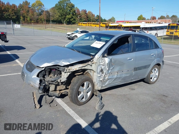 2009 Kia Rio LX with VIN KNADE243696547512, listed as a IAAI auction lot 40639932 with 204,809 mi miles. Bid and sale history available at carsss.com. Image 2.