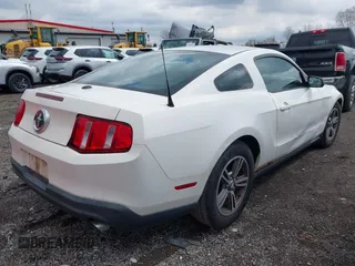 2011 Ford Mustang V6 with VIN 1ZVBP8AM9B5166461, listed as a IAAI auction lot 41997889 with 186,366 mi miles and . Bid and sale history available at carsss.com. Image 4.
