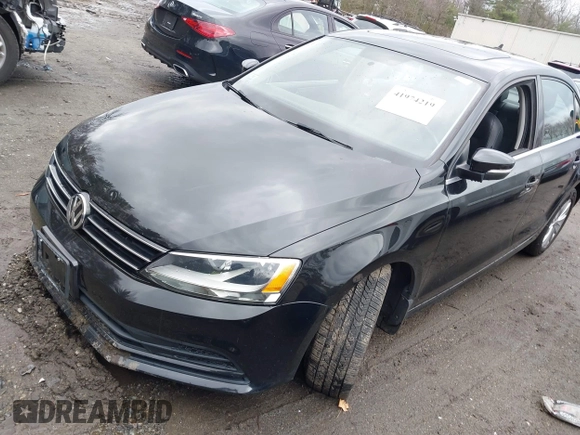 2015 Volkswagen Jetta Sedan 1.8T SE with VIN 3VWD17AJ3FM225093, listed as a IAAI auction lot 41974219 with 69,061 mi miles. Bid and sale history available at carsss.com. Image 2.