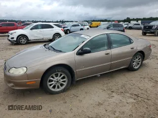 1999 Chrysler LHS with VIN 2C3HC56G6XH667242, listed as a Copart auction lot 71346694 with Not Provided miles and Salvage Title. Bid and sale history available at carsss.com. Image 1.