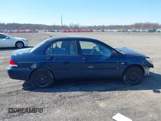 2006 Mitsubishi Lancer ES with VIN JA3AJ26E86U053917, listed as a IAAI auction lot 41760174 with 217,250 mi miles. Bid and sale history available at carsss.com. Image 12.