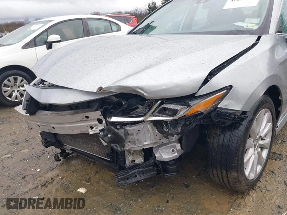 2020 Toyota Camry LE with VIN 4T1C11AK5LU869525, listed as a IAAI auction lot 41693706 with 134,201 mi miles. Bid and sale history available at carsss.com. Image 6.