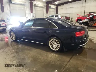 2014 Audi A8 4.0T with VIN WAUR2AFD8EN006198, listed as a Copart auction lot 85272544 with 105,058 mi miles and Salvage Title. Bid and sale history available at DreamBid. Image 2.