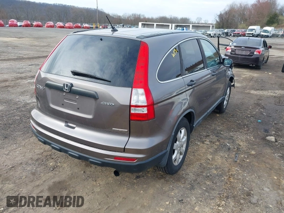 2011 Honda CR-V SE with VIN 5J6RE4H48BL042063, listed as a IAAI auction lot 41985314 with 138,097 mi miles. Bid and sale history available at carsss.com. Image 4.
