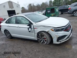 2021 Volkswagen Jetta GLI S with VIN 3VW6T7BU4MM089775, listed as a IAAI auction lot 41937045 with 63,010 mi miles and . Bid and sale history available at DreamBid. Image 13.
