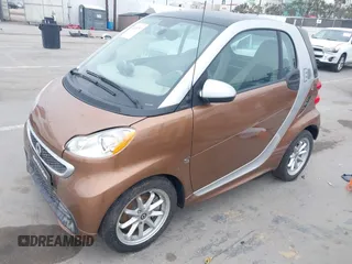 2015 Smart fortwo Passion with VIN WMEEJ9AA4FK831076, listed as a IAAI auction lot 42424797 with Not provided miles and . Bid and sale history available at DreamBid. Image 2.