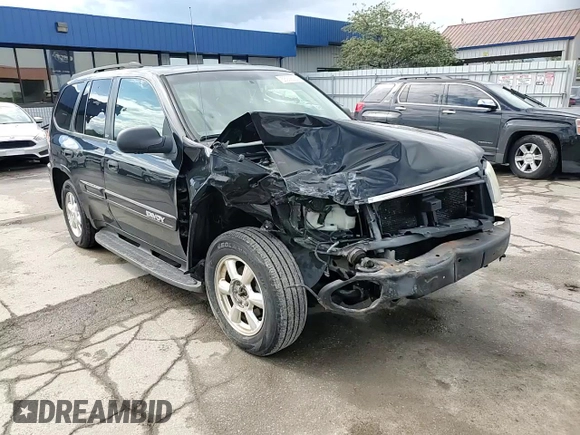2003 GMC Envoy SLE z VIN 1GKDT13S432160651, wystawiony jako Copart lot #56938205 z przebiegiem 197 593 mil mil oraz Szkoda całkowita • Salvage title. Historia ofert i sprzedaży dostępna na DreamBid. Obrazek 14.