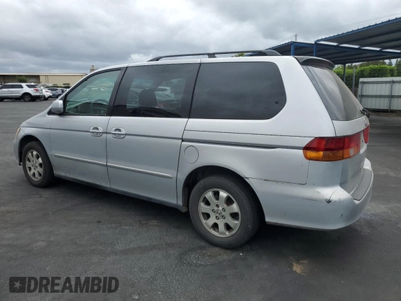 2002 Honda Odyssey EX-L with VIN 2HKRL18902H506828, listed as a Copart auction lot 53735625 with 214,446 mi miles and Salvage title. Bid and sale history available at DreamBid. Image 2.