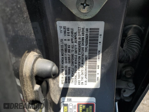 2013 Honda Insight z VIN JHMZE2H31DS000827, wystawiony jako Copart lot #60745645 z przebiegiem 172 694 mil mil oraz Szkoda całkowita • Salvage title. Historia ofert i sprzedaży dostępna na DreamBid. Obrazek 12.
