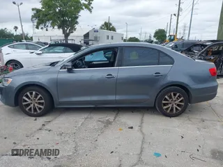 2013 Volkswagen Jetta Sedan SE with VIN 3VWDP7AJ3DM363891, listed as a IAAI auction lot 41995436 with 105,994 mi miles. Bid and sale history available at carsss.com. Image 14.