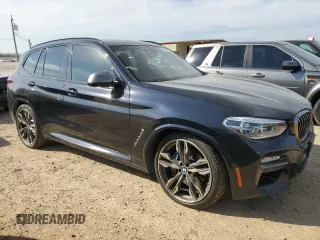 2019 BMW X3 M40i with VIN 5UXTS3C54K0Z05732, listed as a Copart auction lot 45658765 with 103,357 mi miles and Salvage Title. Bid and sale history available at DreamBid. Image 4.