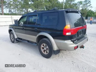 1999 Mitsubishi Montero Sport LS with VIN JA4MT31HXXP024168, listed as a IAAI auction lot 42064951 with 123,539 mi miles. Bid and sale history available at carsss.com. Image 3.