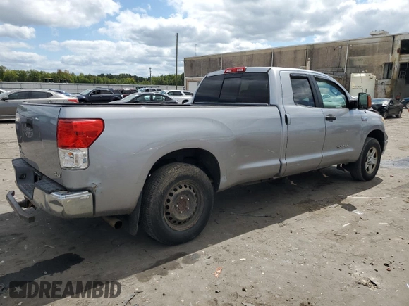 2012 Toyota Tundra 4WD Truck with VIN 5TFCY5F15CX013941, listed as a Copart auction lot 69946754 with 163,228 mi miles and Salvage Title. Bid and sale history available at carsss.com. Image 3.