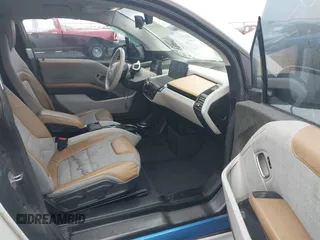 2014 BMW i3 z VIN WBY1Z4C55EV273629, wystawiony jako IAAI lot #41337472 z przebiegiem 113 122 mil mil oraz . Historia ofert i sprzedaży dostępna na DreamBid. Obrazek 5.