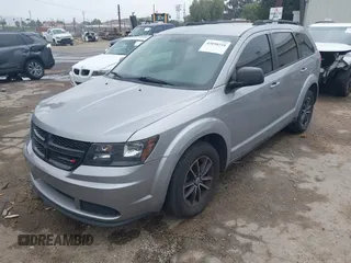 2018 Dodge Journey SE with VIN 3C4PDCAB1JT141295, listed as a IAAI auction lot 42098218 with 110,691 mi miles. Bid and sale history available at carsss.com. Image 17.
