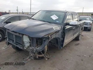 2019 Ram 1500 Limited z VIN 1C6SRFHT9KN594990, wystawiony jako IAAI lot #41760766 z przebiegiem 102 740 mil mil oraz . Historia ofert i sprzedaży dostępna na DreamBid. Obrazek 2.