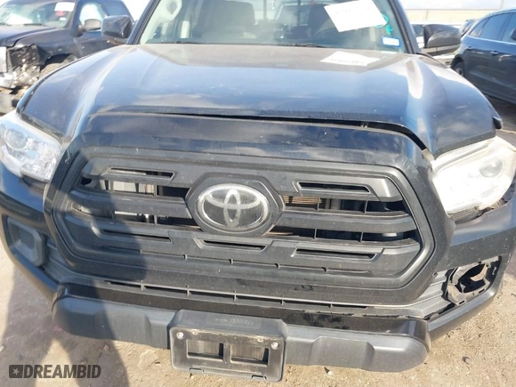 2019 Toyota Tacoma 2WD SR with VIN 5TFAX5GN2KX139779, listed as a IAAI auction lot 41489762 with 90,909 mi miles. Bid and sale history available at carsss.com. Image 12.