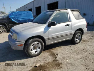 2002 Chevrolet Tracker z VIN 2CNBE18C226913895, wystawiony jako Copart lot #83248644 z przebiegiem 122 332 mil mil oraz Czysty tytuł • Clean title. Historia ofert i sprzedaży dostępna na DreamBid. Obrazek 1.