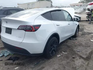 2023 Tesla Model Y Long Range with VIN 7SAYGDEE2PA145398, listed as a IAAI auction lot 41546573 with 20,812 mi miles and . Bid and sale history available at carsss.com. Image 4.