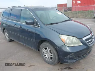 2005 Honda Odyssey EX with VIN 5FNRL38465B108123, listed as a IAAI auction lot 41961270 with 169,948 mi miles. Bid and sale history available at carsss.com. Image 12.