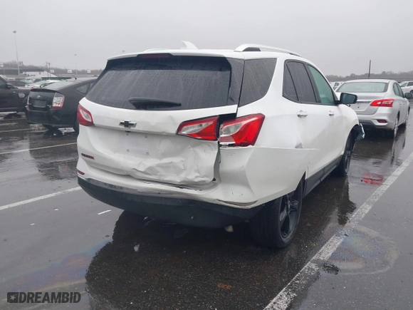2021 Chevrolet Equinox Premier with VIN 2GNAXNEV7M6112087, listed as a IAAI auction lot 41102702 with 32,995 mi miles. Bid and sale history available at carsss.com. Image 6.