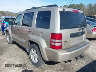 2011 Jeep Liberty Sport Jet with VIN 1J4PN2GK8BW529905, listed as a IAAI auction lot 41600214 with 169,199 mi miles and . Bid and sale history available at carsss.com. Image 3.