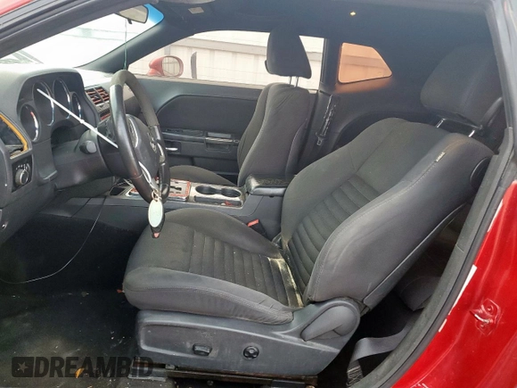 2013 Dodge Challenger SXT z VIN 2C3CDYAG3DH645792, wystawiony jako Copart lot #57351105 z przebiegiem 170 572 mil mil oraz Szkoda całkowita • Salvage title. Historia ofert i sprzedaży dostępna na DreamBid. Obrazek 7.