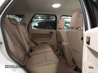 2012 Ford Escape XLT z VIN 1FMCU9DG4CKA72675, wystawiony jako IAAI lot #41212739 z przebiegiem 112 781 mil mil oraz . Historia ofert i sprzedaży dostępna na DreamBid. Obrazek 8.