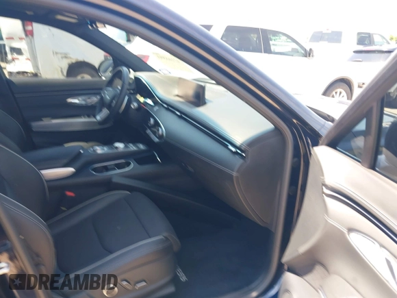 2023 Genesis GV70 2.5T z VIN KMUMADTB8PU132393, wystawiony jako IAAI lot #42166593 z przebiegiem 24 430 mil mil oraz . Historia ofert i sprzedaży dostępna na DreamBid. Obrazek 5.