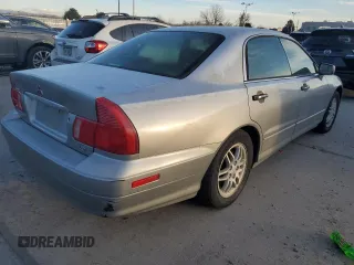 2000 Mitsubishi Diamante LS z VIN 6MMAP67P5YT006608, wystawiony jako Copart lot #49009455 z przebiegiem 241 503 mil mil oraz Tytuł czysty. Historia ofert i sprzedaży dostępna na DreamBid. Obrazek 3.