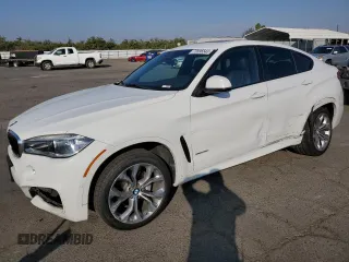 2018 BMW X6 xDrive35i with VIN 5UXKU2C52J0Z61957, listed as a Copart auction lot 73596543 with 87,119 mi miles. Bid and sale history available at carsss.com. Image 1.