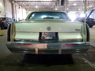 1995 Cadillac Fleetwood z VIN 1G6DW52P5SR715543, wystawiony jako Copart lot #51841755 z przebiegiem 92 222 mil mil oraz Czysty tytuł • Clean title. Historia ofert i sprzedaży dostępna na DreamBid. Obrazek 6.