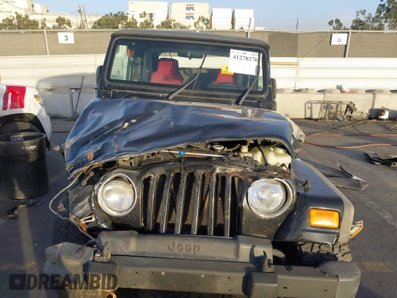 2005 Jeep Wrangler Unlimited with VIN 1J4FA44S35P314941, listed as a IAAI auction lot 41278276 with 248,865 mi miles. Bid and sale history available at carsss.com. Image 11.