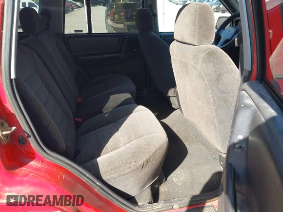 1998 Jeep Grand Cherokee Laredo with VIN 1J4FX58S9WC137514, listed as a IAAI auction lot 42305247 with 228,669 mi miles and . Bid and sale history available at DreamBid. Image 8.