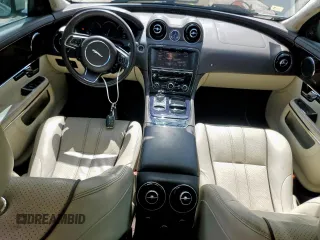 2013 Jaguar XJ Portfolio with VIN SAJWJ2GD5D8V49505, listed as a Copart auction lot 61171955 with 129,158 mi miles and Salvage title. Bid and sale history available at DreamBid. Image 8.